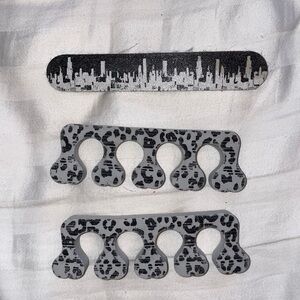 Nail file toe separation manicure pedicure mani pedi NYC New York City skyline